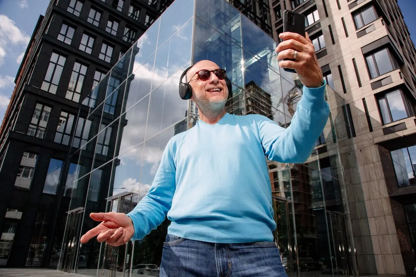 Happy older adult listening to music