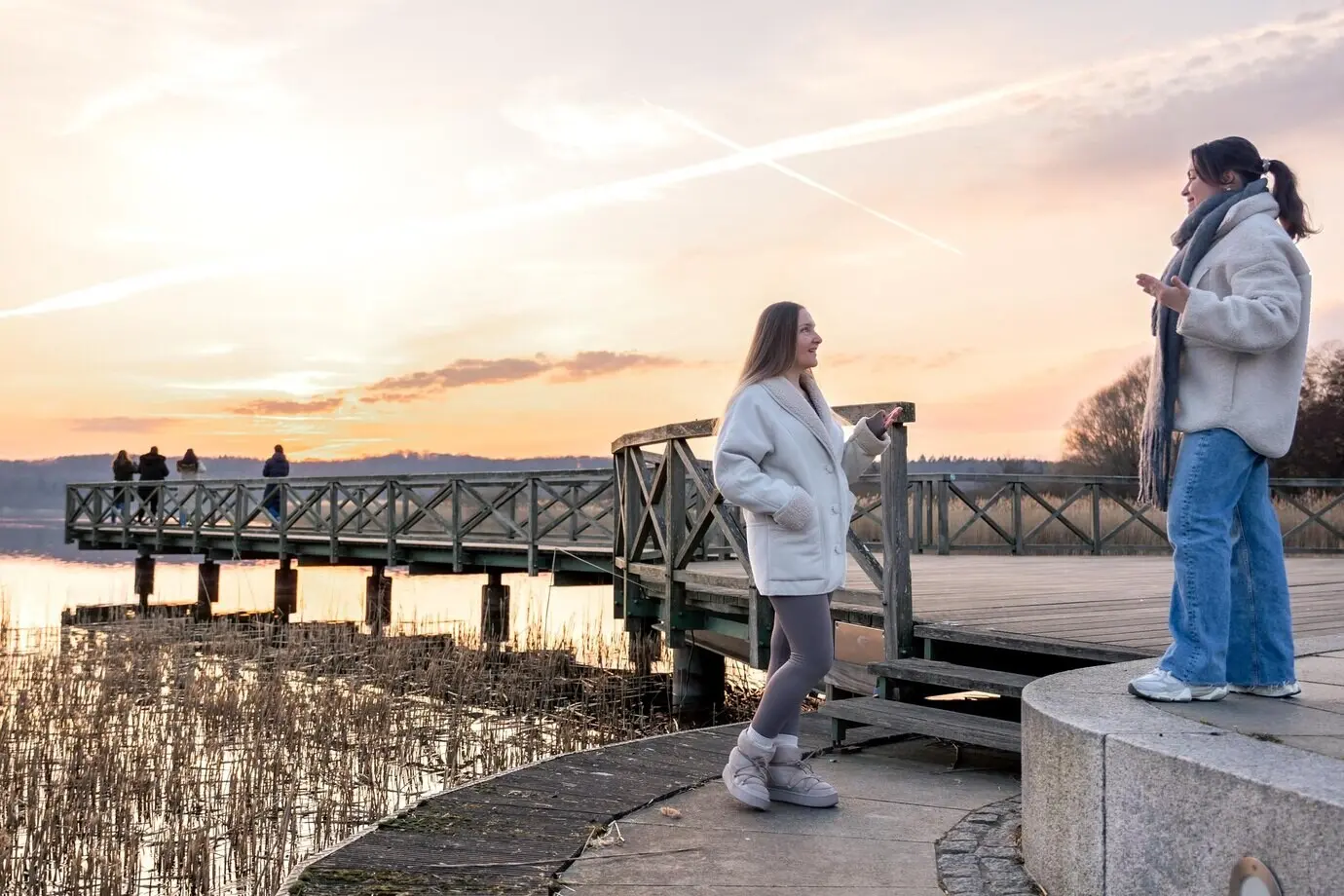 A sunset walk along the seaside promenade, walking in nature.